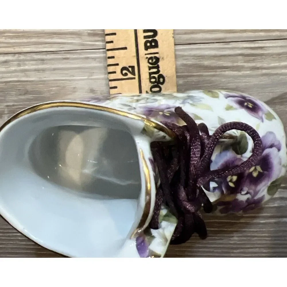 NANTUCKET HOME PORCELAIN Baby Shoe‎ with Violets, Gold Trim and Purple Lace